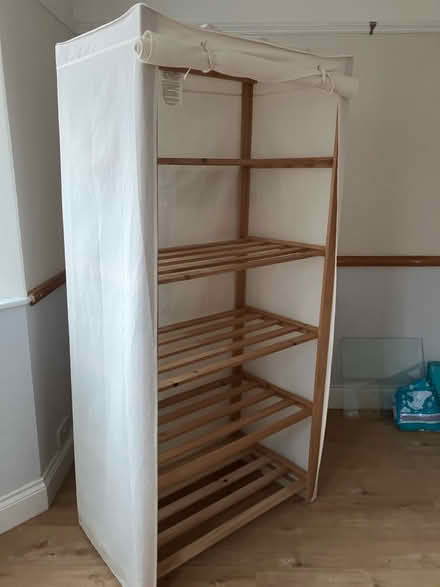 Photo of free Tall shelves with cotton cover (Oulton, Lowestoft NR32) #1