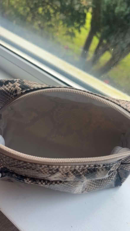 Photo of free Snake print make up bag (Coulsdon town station) #1