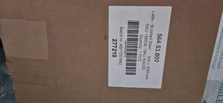 Photo of free Brushed aluminium splashback back (South Woodford E18) #1