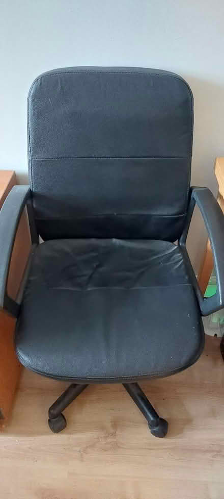 Photo of free Black faux leather office chair (weedon) #1