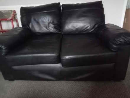 Photo of free 2 x black leather sofas (M32 Stretford) #1