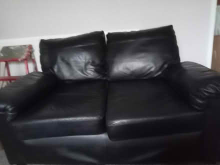 Photo of free 2 x black leather sofas (M32 Stretford) #2
