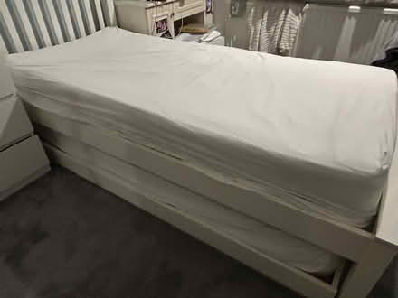 Photo of free M&S pretty white single trundle bed with two mattresses (Winchmore Hill N21) #1