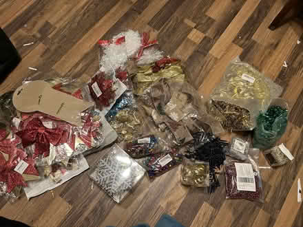 Photo of free Christmas decorations bells, poinsettias ribbon, bows, tinsel (Kenilworth CV8) #1