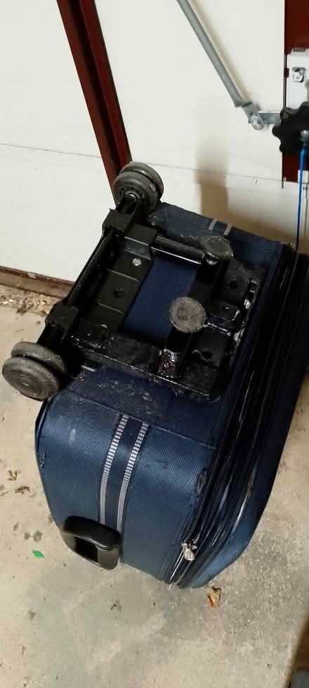 Photo of free Blue medium sized suitcase (Emmbrook RG41) #1