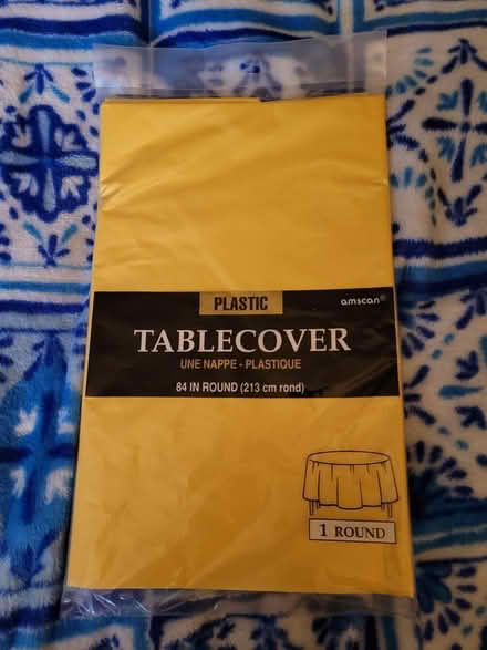Photo of free NEW Plastic Yellow Tablecloth (Los Altos Hills, CA) #1