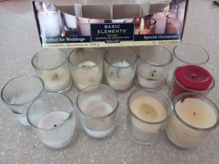 Photo of free magazines, broth, used votives (55th & Main) #2