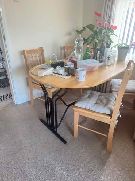 Photo of free Table with 4 chairs and cushion (Stanground) #2