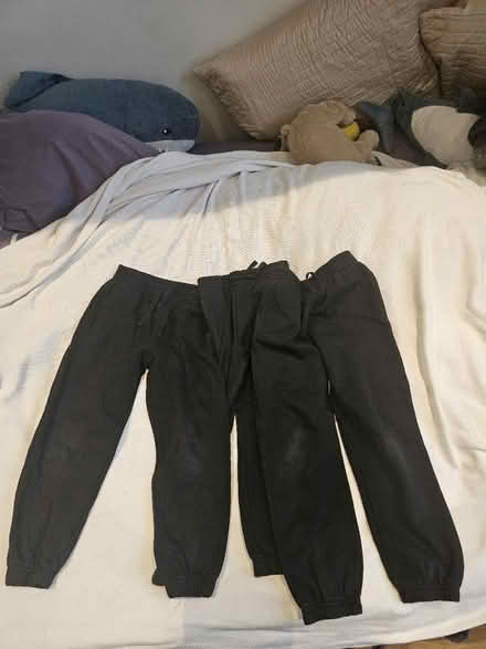 Photo of free 5 black school joggers 8yo,7 yo (EC1R) #1