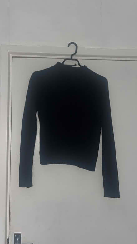 Photo of free Black knitwear jumper (Coulsdon town station) #1