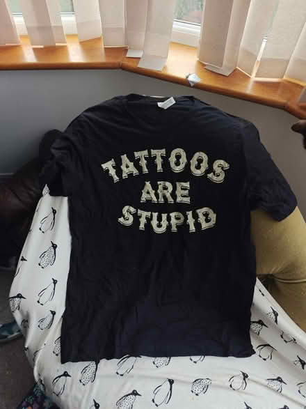 Photo of free T-shirt (NE11) #1