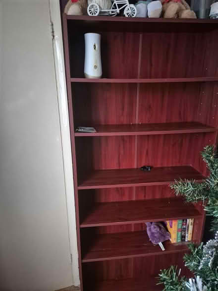Photo of free Tall book / dvd unit (Gu152rw Camberley) #1