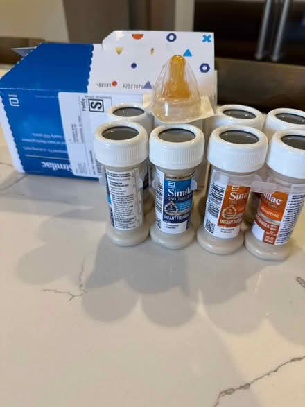 Photo of free Similac formula bottles (19803) #1