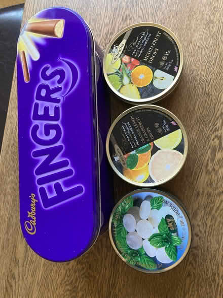 Photo of free Four tins (Dudleston Heath SY12) #1