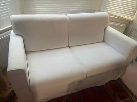 Photo of free Small ikea two seater sofa with loose cover - clean and in good condition must be collected by the end of tomorrow. Already dismantled (Shepherds Bush W6) #1