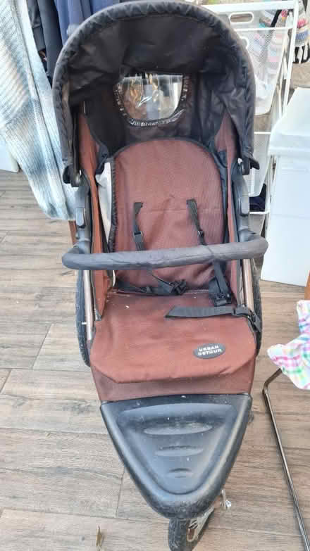 Photo of free 3 wheel buggy with raincover (Lancaster freehold) #1
