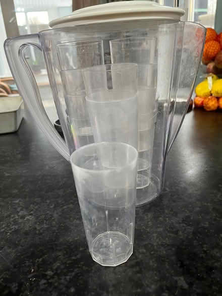 Photo of free Old filter jug and 11 plastic glasses (Presteigne LD8) #1