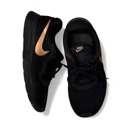 Photo of free Nike Woman's Gold On Black Sneakers (Brooklyn Storage) #1