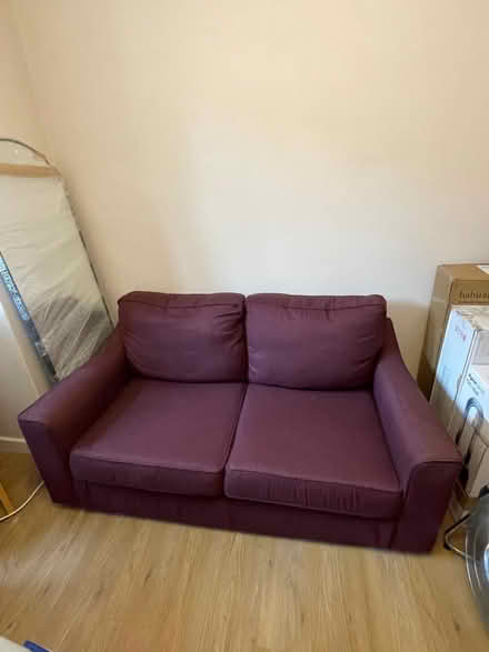 Photo of free Burgundy two seater sofa (Lower Clapton E5) #1