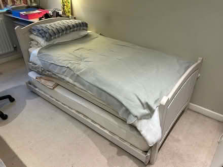 Photo of free Single bed with fire label on the mattress. Has a trundle bed which stores underneath. (nottinghamfreegle CGA NG5) #1