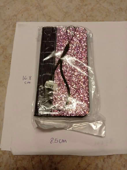 Photo of free Purple sparkling phone cover (Castlefield HP11) #1