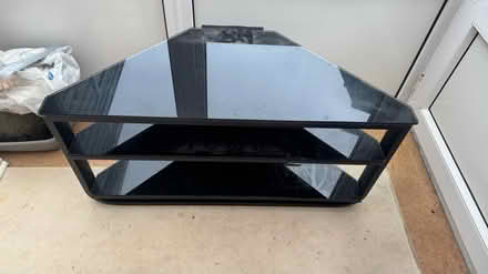 Photo of free Black Glass TV / AV unit (Leighton Buzzard LU7 3) #1