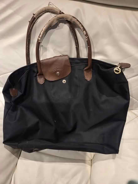 Photo of free Large black zip up bag (Frimley) #1