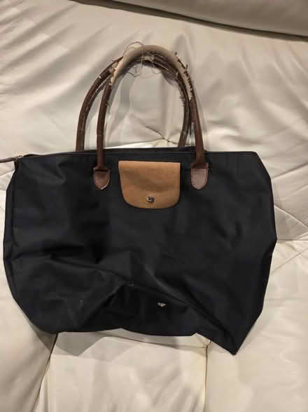 Photo of free Large black zip up bag (Frimley) #2