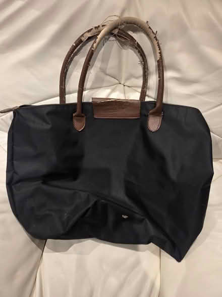 Photo of free Large black zip up bag (Frimley) #3