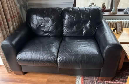Photo of free Black Leather Two Seat Sofa & Footstool (Cassiobury WD17) #2