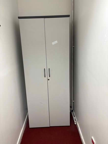 Photo of free Tall wooden cupboard. (Frizinghall BD9) #1