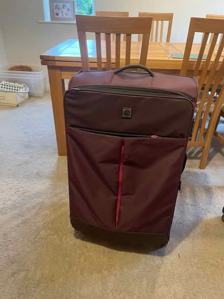 Photo of free Large Purple suitcase (Longbarn WA2) #1