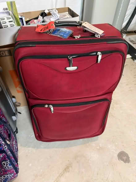 Photo of free Two large suitcases (Marlboro Rodge) #1