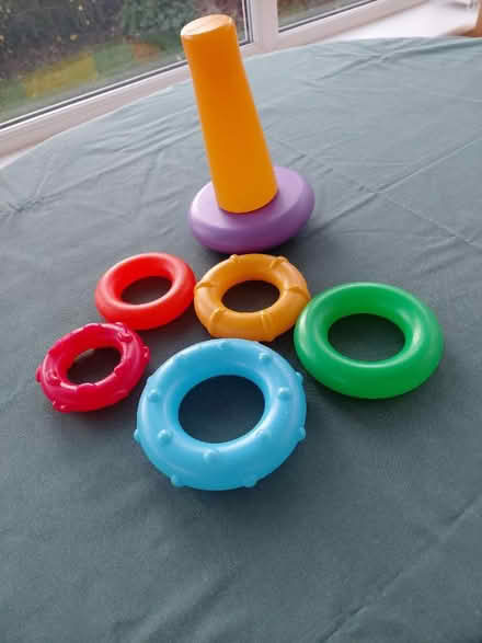 Photo of free Coloured plastic rings and holder (Hingham NR9) #1
