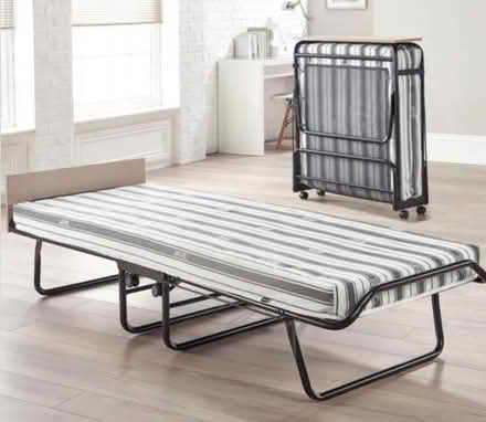 Photo of free Single put you up bed with mattress (Romford RM3) #1