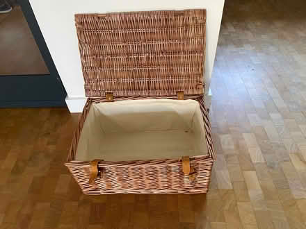 Photo of free EMPTY medium wicker hamper with H on lid (Putney SW15) #2