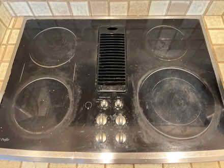 Photo of free GE profile 4 burner electric stove (Pleasant Valley Road Aptos) #1