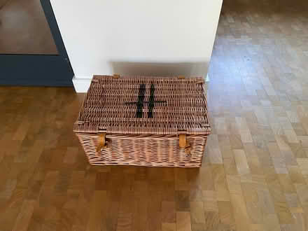 Photo of free EMPTY medium wicker hamper with H on lid (Putney SW15) #1