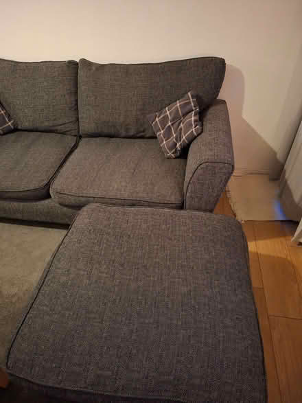 Photo of free Grey sofa and footstool (Earlsfield SW17) #3