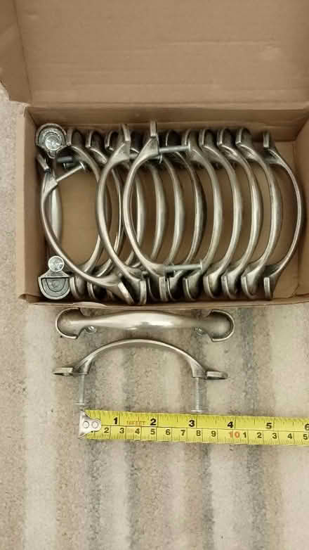 Photo of free 17 matching cupboard door or drawer handles. (New Town TN22) #1