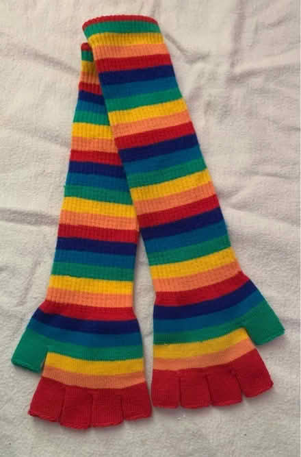 Photo of free Child’s/teenager pair of long rainbow stripey fingerless gloves (Slyfield GU1) #1
