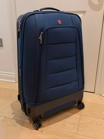 Photo of free Blue 4-wheel Swiss Gear suitcase (Eastleigh SO50) #1