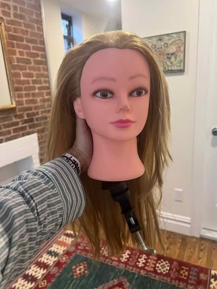 Photo of free Doll head for hair cut (Soho) #1