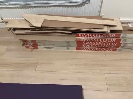 Photo of free White Snow Laminate Flooring (3 Packs + Offcuts) and one hardboard cut i (Victoria SW1V) #1