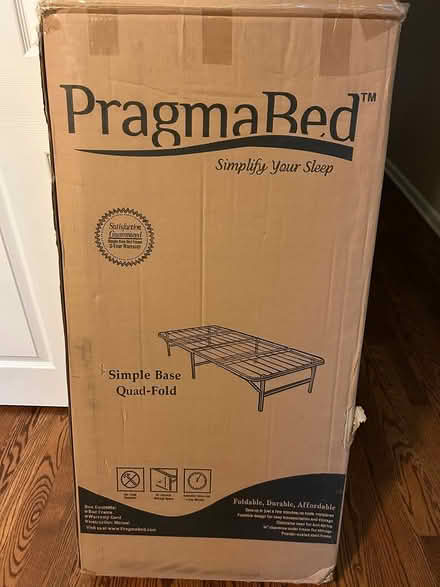 Photo of free Folding twin bed frame (West Glenview) #2