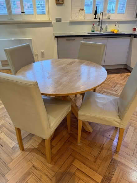Photo of free Table round and 4 leather chairs (Enfield N13) #1