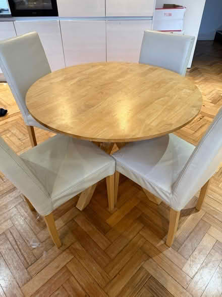 Photo of free Table round and 4 leather chairs (Enfield N13) #4