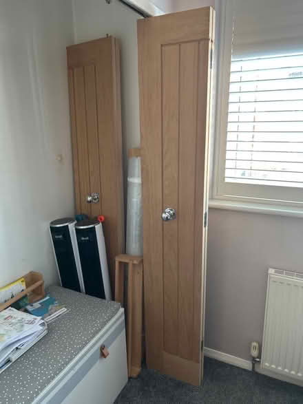Photo of free 4 woodden bi-fold closet doors (Shenfield CM13) #1