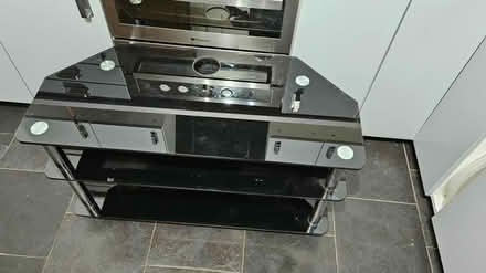 Photo of free Black glass and chrome TV stand (Somercotes, Alfreton DE55) #1