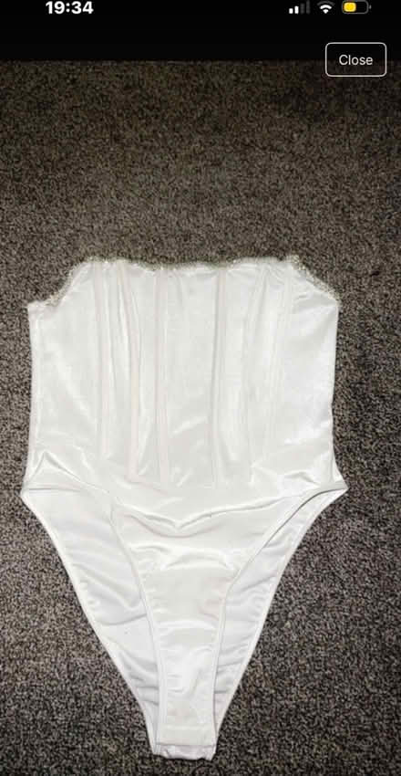 Photo of free White and black body suit (Waltham cross EN8) #1